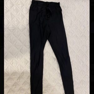 The upside. Black leggings with tie detail.